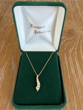 Gold Curved Diamond Pendant Necklace
